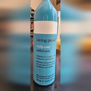 Living Proof Scalp Care Exfoliator in Blue and White